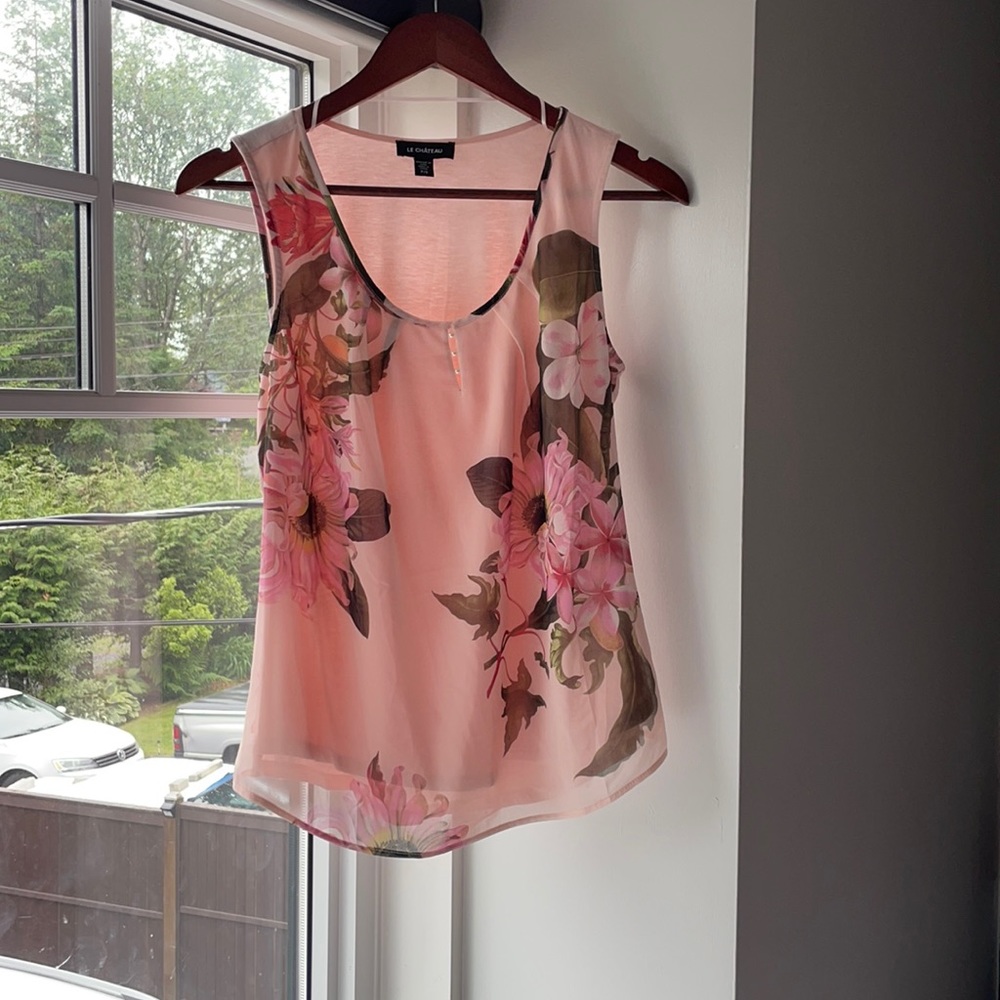 Floral print top. New condition, never worn.